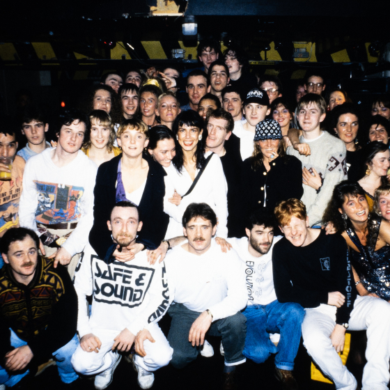 A happy crowd posing for a photo in the Liverpool Underground nightclub in the 80s.