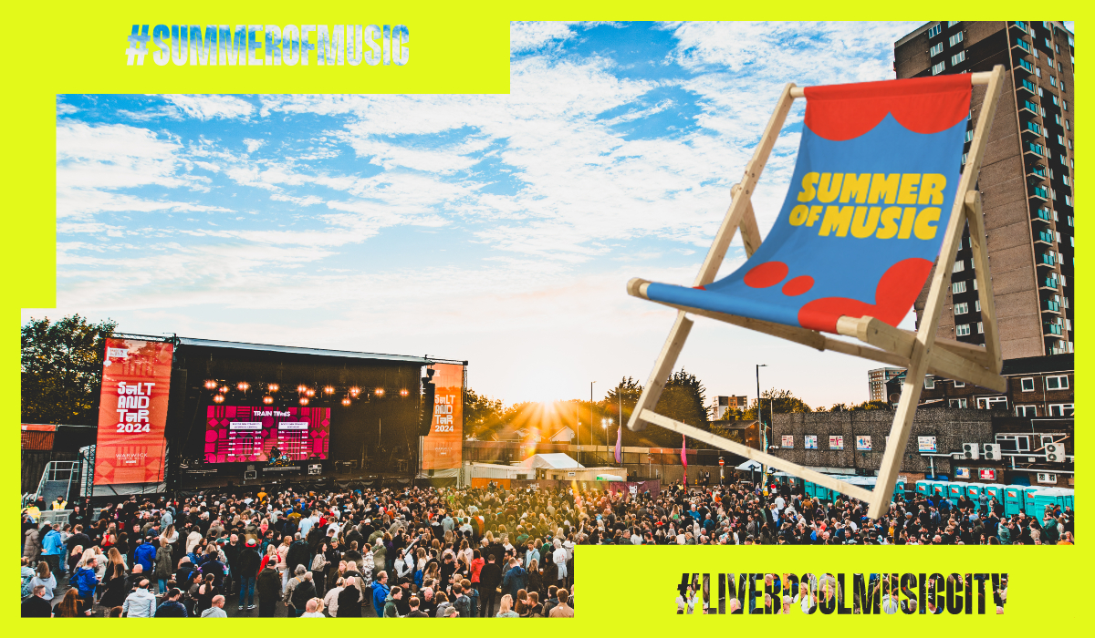 A music festival with a large crowd of people infront of a stage. Ther eis a deck chair layed on top of the image.